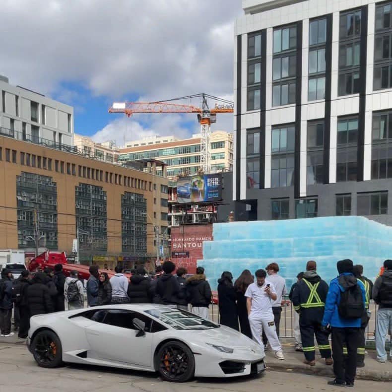 Fans breaking Drake Iceman rollout ice sculpture